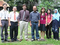 Prof Dougherty with a group at UM